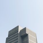 low angle photography of grey building
