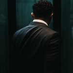 man in black suit jacket